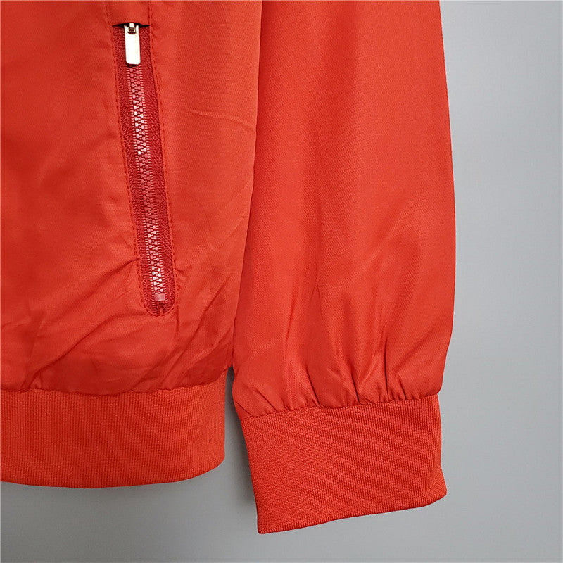 Coupe-vent International redwhite 20/21