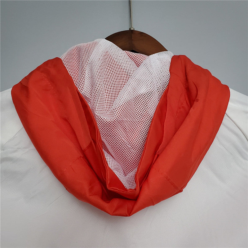 Coupe-vent International redwhite 20/21